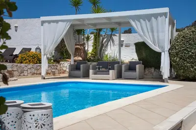 a swimming pool with a gazebo at Luxury Seaside Villa Plumeria ,50m to Sandy Beach, Chania in Tersanas