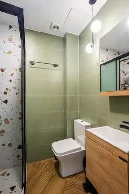 a bathroom with a toilet and a sink at Fanouris Luxury Apartments 2 in Chania Town