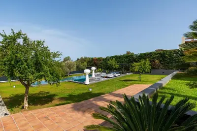 a view of a park with cars in a parking lot at Chania lux villa with Heated pool in Chania Town