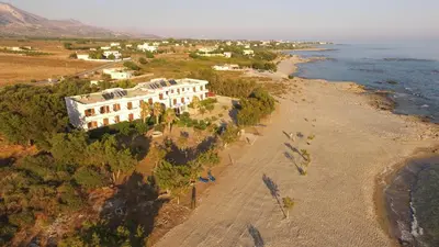 an aerial view of a building on the beach at Studios Stavris in Frangokastello