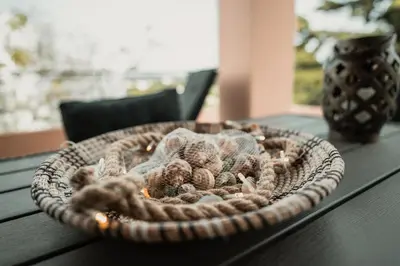 a basket on top of a table with a vase at Helen Sweet Home in Kounoupidhianá