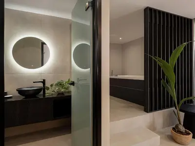 a bathroom with a sink and a mirror at Theta Boutique Hotel in Chania Town