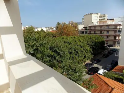 an overhead view of a parking lot with trees and cars at Alena home in Chania Town