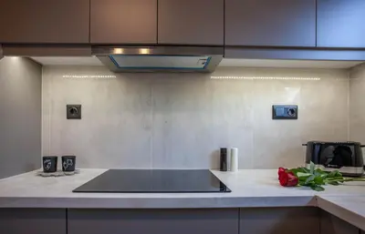 a kitchen with a counter top with a stove at Makel Apartment in Chania Town