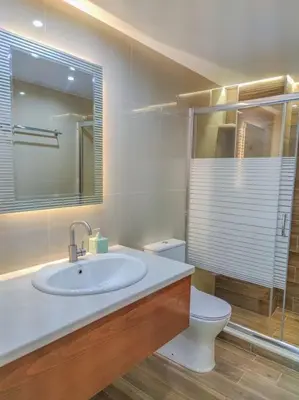 a bathroom with a sink and a toilet at Renovated apartment 2 -Platanias in Plataniás