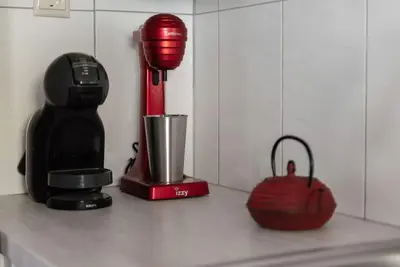 a kitchen counter with a coffee maker and a blender at Casa Valore central with parking by 8essentially in Chania Town
