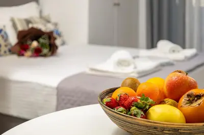 a bowl of fruit sitting on a table at Koum Kapi Mare Studios B2 in Chania Town
