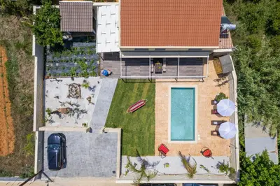 an aerial view of a house with a swimming pool at Garden Villa Chania in Chania Town
