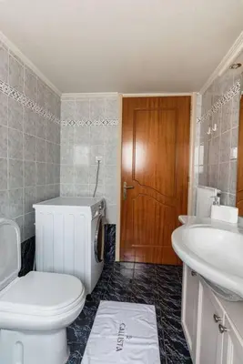 a bathroom with a toilet and a sink at Callista City Living in Chania Town