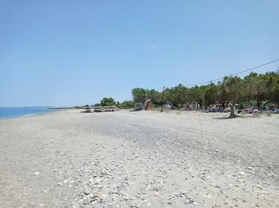 a sandy beach with a lot of people on it at Infinity Night Villa in Chania Town