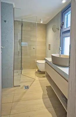 a bathroom with a shower and a sink and a toilet at Il Porto Blu in Chania Town