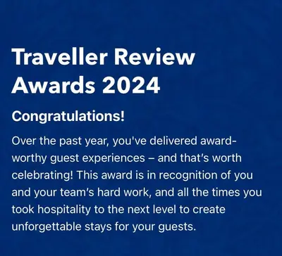 a sign that reads traveller review awards congratulations at Julia's cottage in Kalyves
