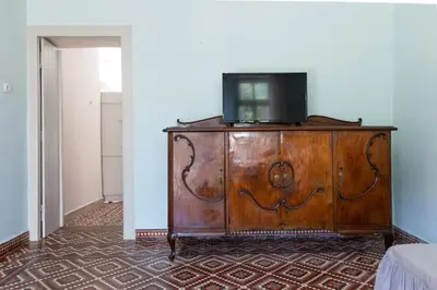 a television on top of a dresser in a room at Argiro's House - Chania Old Town in Chania Town