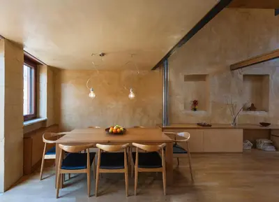 a dining room with a wooden table and chairs at Dorotheou House in Chania Town