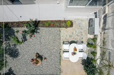 an overhead view of a backyard with a fire hydrant and plants at Estia Comfort House in Chania Town