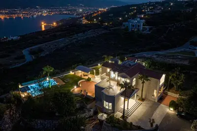 an aerial view of a house at night at Villa Damant in Pithárion
