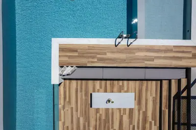 a bathroom with a sink with abee on it at Magical new luxury villa Camellia! in Kissamos