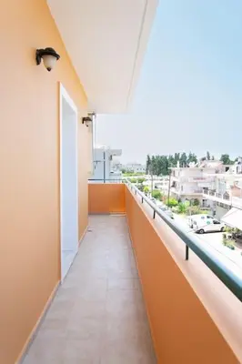 an empty balcony with a view of a city at Kadiani's Residence by 8essentially in Chania Town