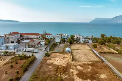an aerial view of a town next to the ocean at Suite Erato in Kissamos
