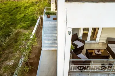 an external view of a balcony of a house at Suite Erato in Kissamos