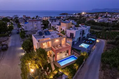 an aerial view of a house with a swimming pool at AnnaBoutique Villa Next to Beach Private Pool & BBQ in Kato Daratso