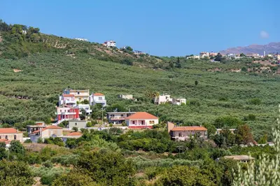 a small village on a hill with houses at Argiros House in Chania Town