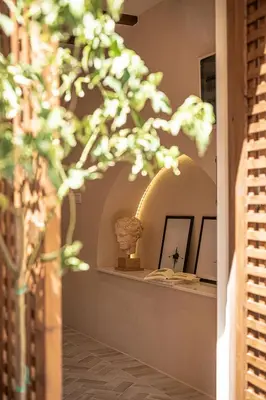 a room with a mirror and a vase on a counter at Artemide city places _Leon tiny suite in Chania Town