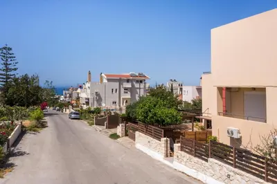 an empty street in a city with buildings at Anna Boutique Apartment in Kato Daratso