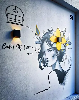 a drawing of a woman with a flower on her head at Central City Loft by NEK in Chania Town