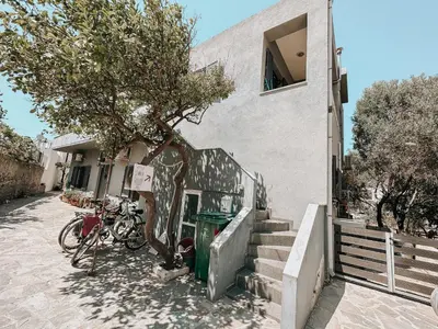 a group of bikes parked next to a building at Stella's Boho Retreat in Palaiochóra