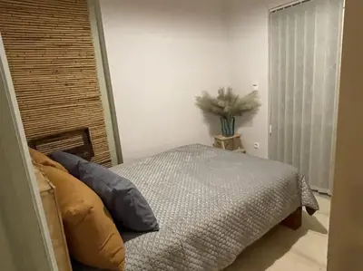 a bedroom with a bed and a window at Enjoy Chania in Chania Town