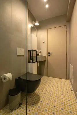 a bathroom with a black bath tub in a room at MAGNOLIA Luxury Chania Central Apartments in Chania Town