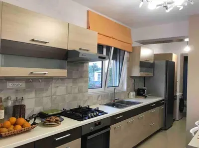 a kitchen with a sink and a stove top oven at Anastasia’s Home in Chania Town