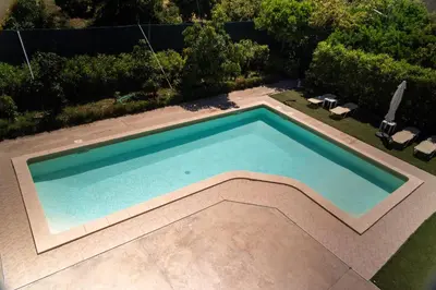 an overhead view of a swimming pool in a yard at Green Orange Villa near Platanias in Chania Town