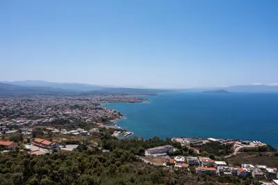 an aerial view of a city and the ocean at Unlimited Blue in Chania Town