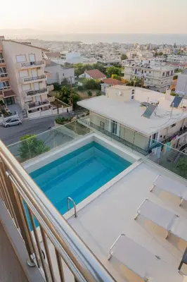 a swimming pool on the balcony of a building at EDEL Suite in Chania Town