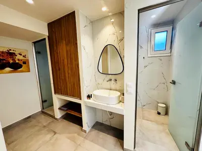 a bathroom with a sink and a mirror at Matina Room in Chania Town
