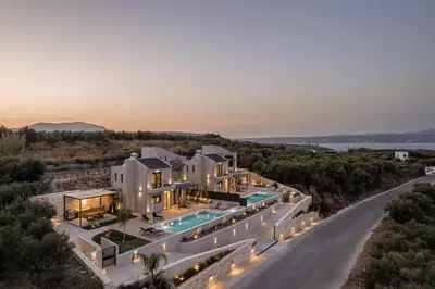 an aerial view of a house with a pool at Melanthia Villas in Tsivarás