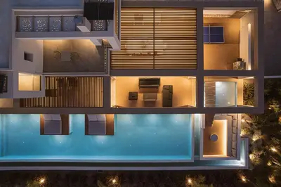 an aerial view of a building with a swimming pool at Villa Aora Falassarna Beach I New luxury villa with infinity pool in Falasarna