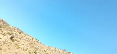 a clear blue sky above a rocky mountain at Spacious Sunny house in Chania in Chania Town