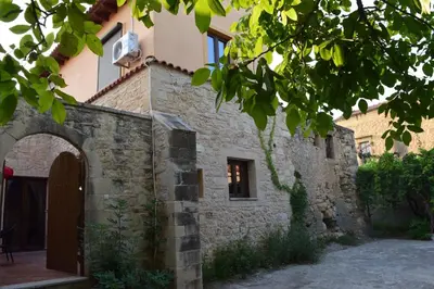 a stone building with an archway in front of it at Venetian Cistern Villa in Kalamítsion Alexándrou