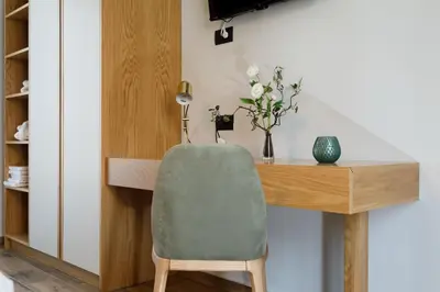 a desk with a green chair in a room at Exquisite Crete Villa Villa Kleanthi 4 Bedroom Private Pool in Stalos