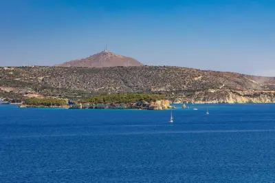 a large body of water with a mountain in the background at Villa Forteza in Kalami
