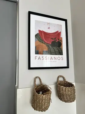 two baskets on a wall with a picture of fashions at Luxury Sunset Villa with Private Pool & Sea Views in Kalyves