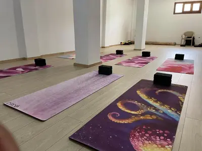 a group of yoga mats on the floor in a room at Kissamos Bay Hotel in Kissamos
