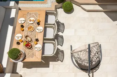 an overhead view of a table and chairs with food at Kallisti Palace - Private Pool with Hydromassage in Kissamos