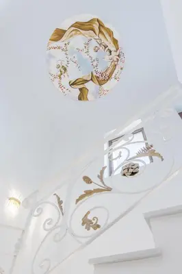 a chandelier in the ceiling of a room at Kallisti Palace - Private Pool with Hydromassage in Kissamos