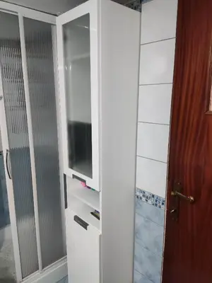 a white cabinet with a television in it at Georgia apartment in Chania Town