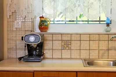 a camera sitting on a counter next to a sink at Paradise Lost in Gerani Chanion