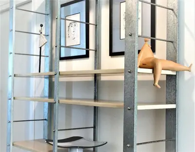 a shelving unit in a room with shelves at SQUARE 45 in Chania Town